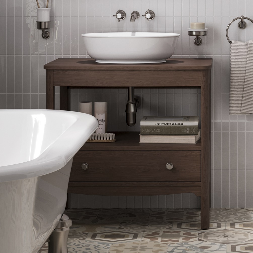 Product Lifestyle Image of Burlington Guild 850 Dark Oak Furniture Unit and Dark Oak Worktop Close up with countertop basin and books on drawer shelf with accessories GU8500DDOK_FS GU850TDOK